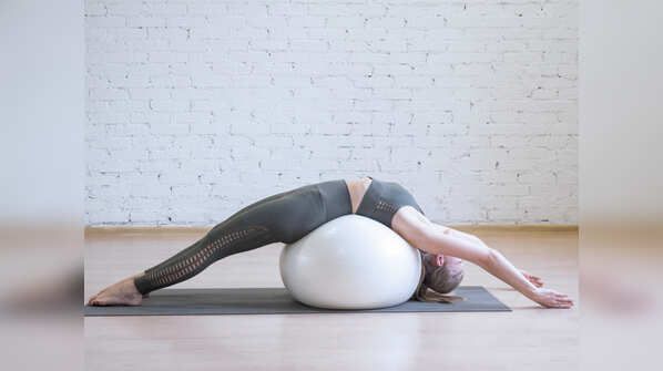 ​​Lay back over the ball