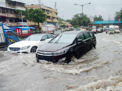 Knee-deep in water on first day of monsoon