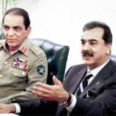 It's govt vs military in Pak as Gilani fires defence secretary