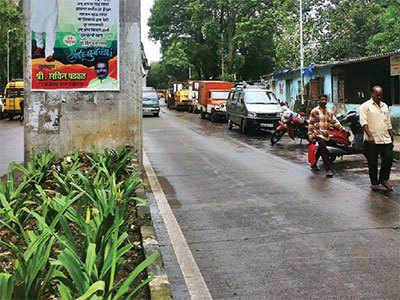 Road widened, but only one lane left for passing vehicles