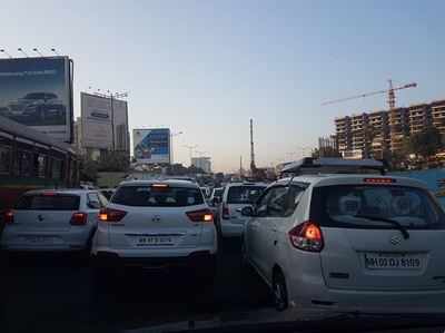Heavy traffic jam on  Western Express Highway as truck upturns on Sahara Star flyover