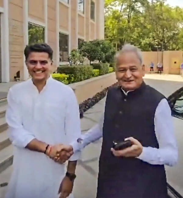 Gehlot, Pilot share rare public warmth at AICC meet