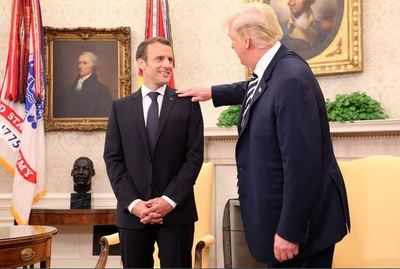 Watch: When US President Donald Trump flicks 'dandruff' off French President Emmanuel Macron's suit
