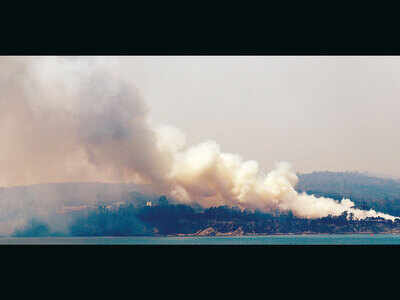 Two wildfires merge into massive inferno in Australia