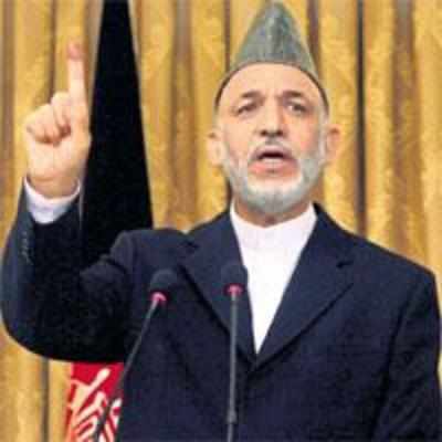 Clear lead for Karzai, but recount ordered