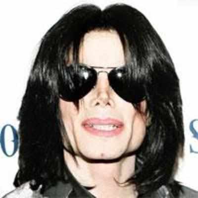MJ's hair retrieved from drain to sell for $5000