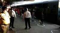 Migrant workers from MP at New Delhi railway station to board Shramik Express for their journey back home 