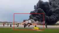 Russian plane lands in flames in Moscow 