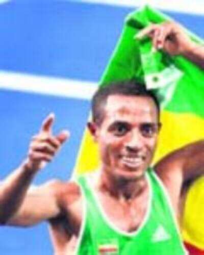 Bekele creates history, wins 4th world title