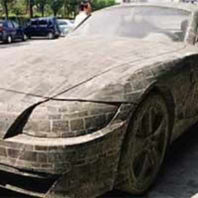 Artist seeks A£80,000 for BMW car made of bricks