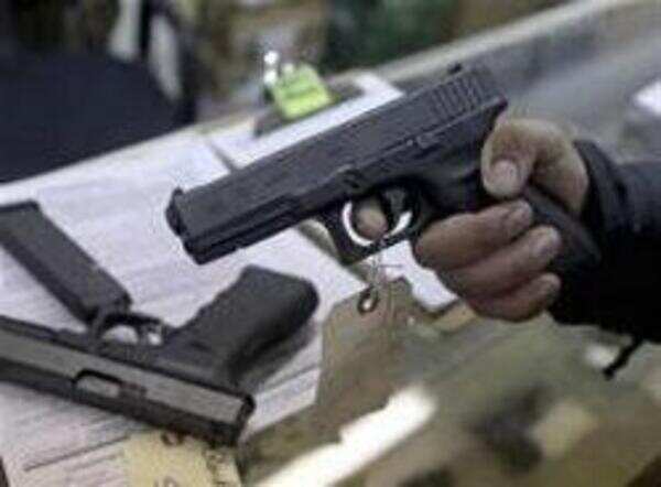 Shooter dies while cleaning gun