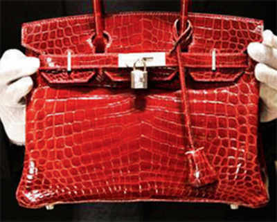 Hermes to probe 'cruelty' to crocs used for Birkin handbags