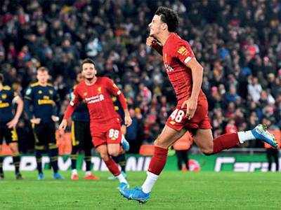 Liverpool oust Arsenal in shootout
