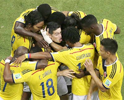 Rodriguez's doubles strike takes Colombia to WC quarters