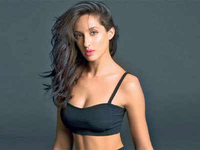 Take One: When Nora Fatehi travelled from men's store to the arc lights