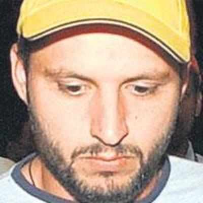 Afridi accused of slapping a fan