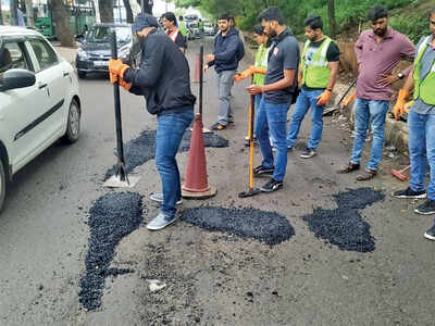 Bengalureans come together to fill potholes