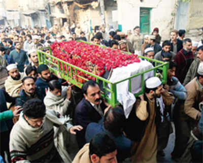 Pak in mourning as parents bury kids