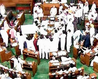 After opposition protests, barriers erected in Lok Sabha