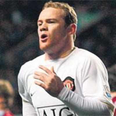 Rooney, Ronaldo star in Man U win
