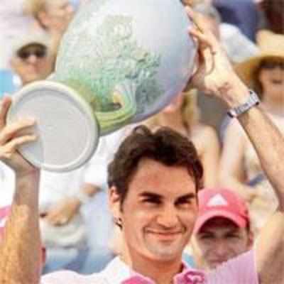 Federer fires warning by ending barren run