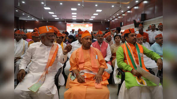 In pics: CM Yogi hoists party flag on BJP's 42nd foundation day
