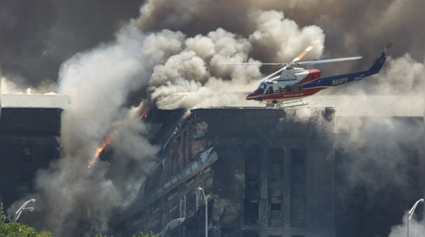 Rescue helicopter surveys damage
