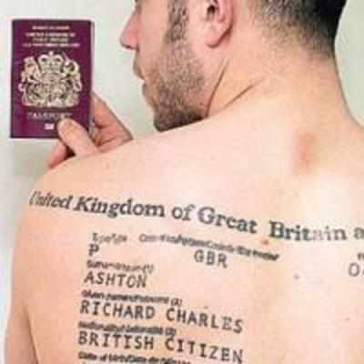 British man gets passport tattooed on back