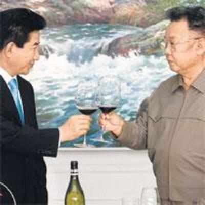 Koreas raise toast to the end of war
