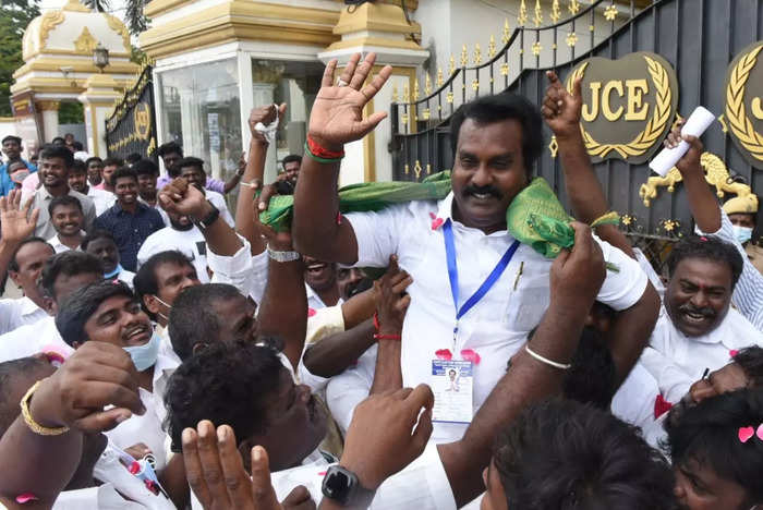 DMK candidate Vishwanathan of ward no. 181 celebrates his victory at Pallikarnai in Chennai