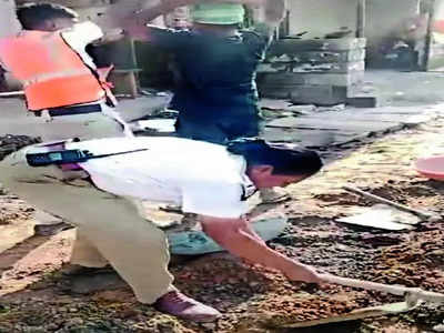 Traffic cops pick up spades to clear silt at Kodathi Gate