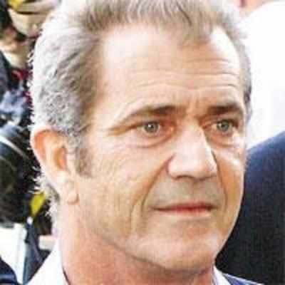 Mel Gibson booked for assault charges