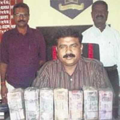 Employee loots bank after being refused loan