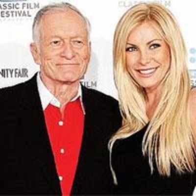 Hefner defends sex life with runaway bride