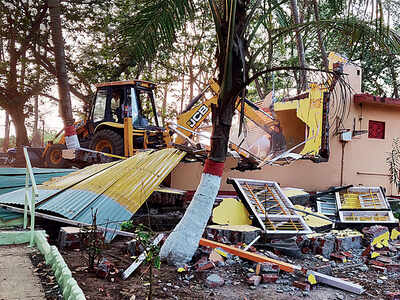 Teams raze illegal structures in Alibaug Teams raze illegal structures in Alibaug