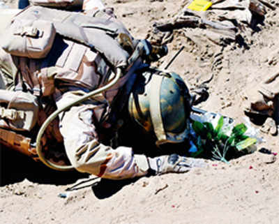 Iraq exhumes mass graves of soldiers slaughtered by ISIS