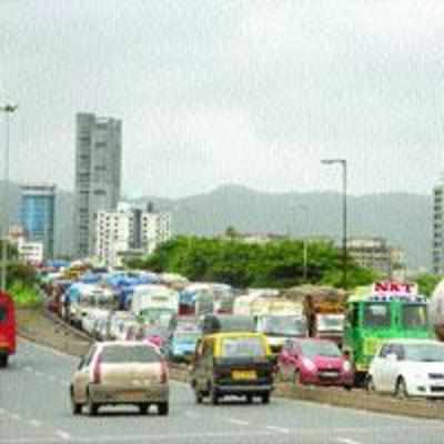 Vital road jammed after trailer overturns