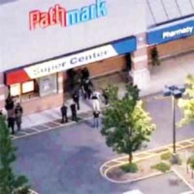 Three dead as ex-Marine opens fire in US store
