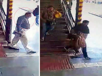 Woman who threw man onto tracks held; says was molested