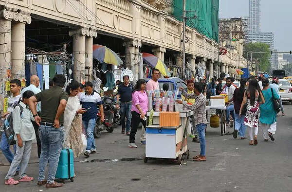 Hawkers take over pedestrian channel in Grand Hotel zone