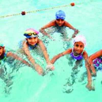 Young YMCA swimmers shine during competition