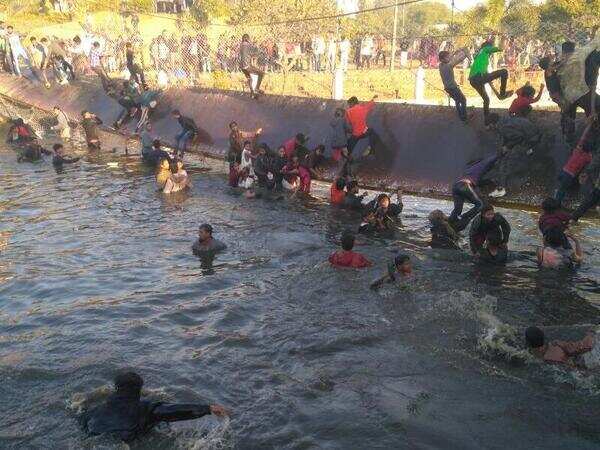 Miraculous escape for children after a rope bridge over a lake collapses