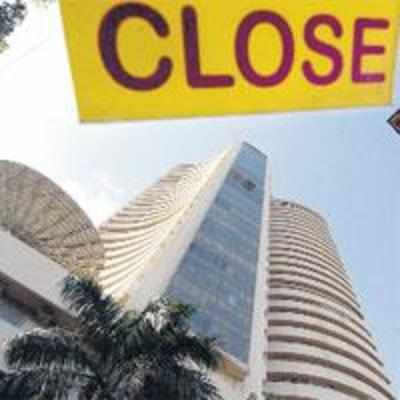 Sensex slips again on global worries; but gold shines