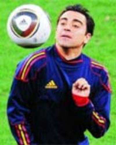 Pass masters Xavi and Iniesta are scoring high in tandem