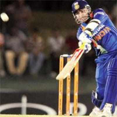 Sehwag played a sedate anchor role to take India to a win after bowlers restricted Lanka to 170