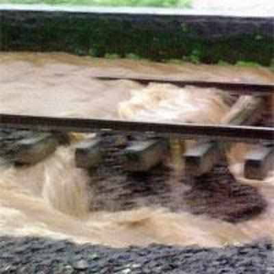 Rains wash away gravel beneath CR tracks