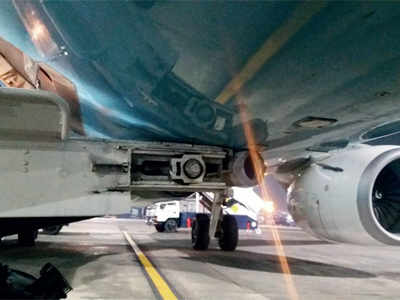 Tug hits Jet flight at airport parking bay