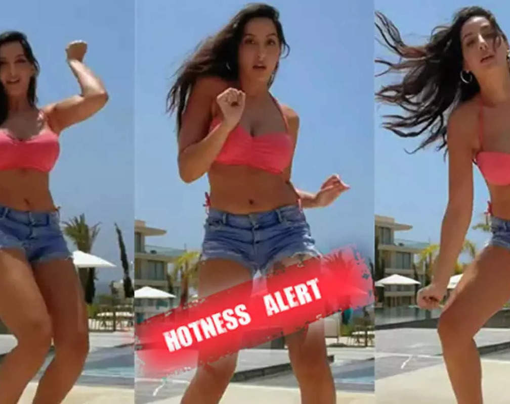 
HOTNESS ALERT! Nora Fatehi's old video dancing with friends wearing tube top and shorts on a beach goes viral
