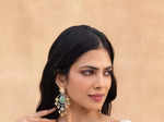 Malavika Mohanan's stylish look in white organza saree