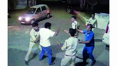Caught boozing in car, CID inspector misbehaves with cops